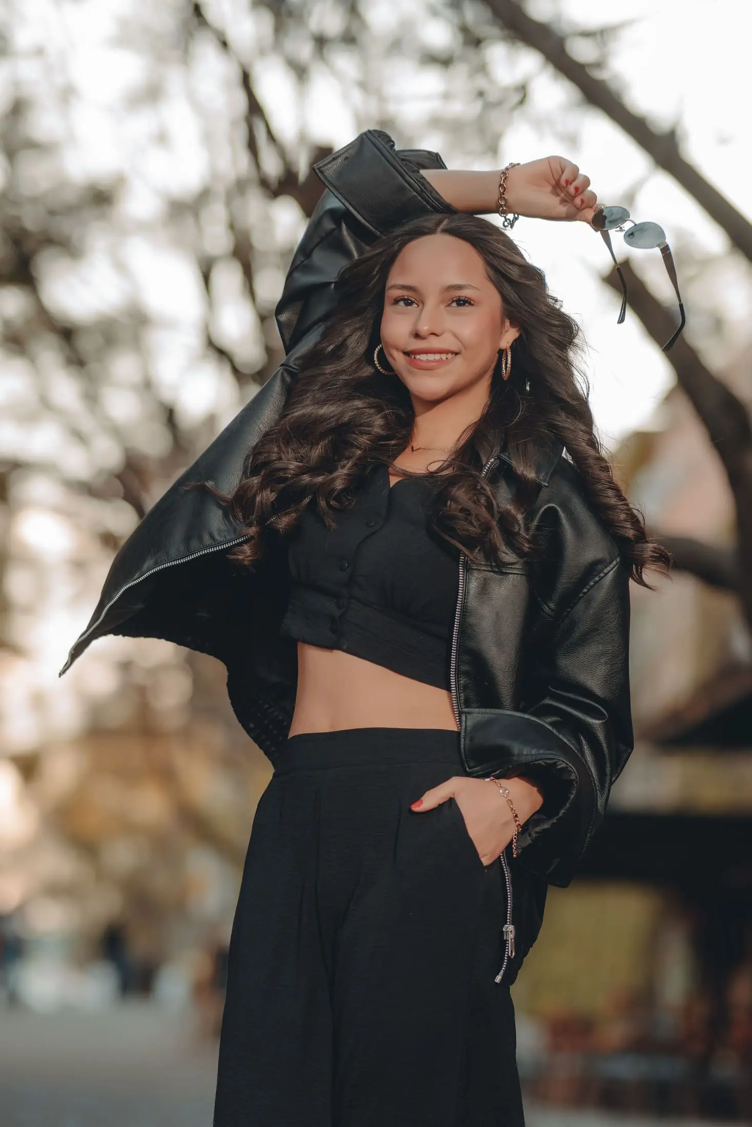 Person smiling in an outdoor portrait